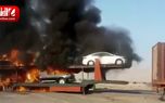 آتش گرفتن تریلی حامل خودروهای لوکس در جاده بندر عباس +فیلم
